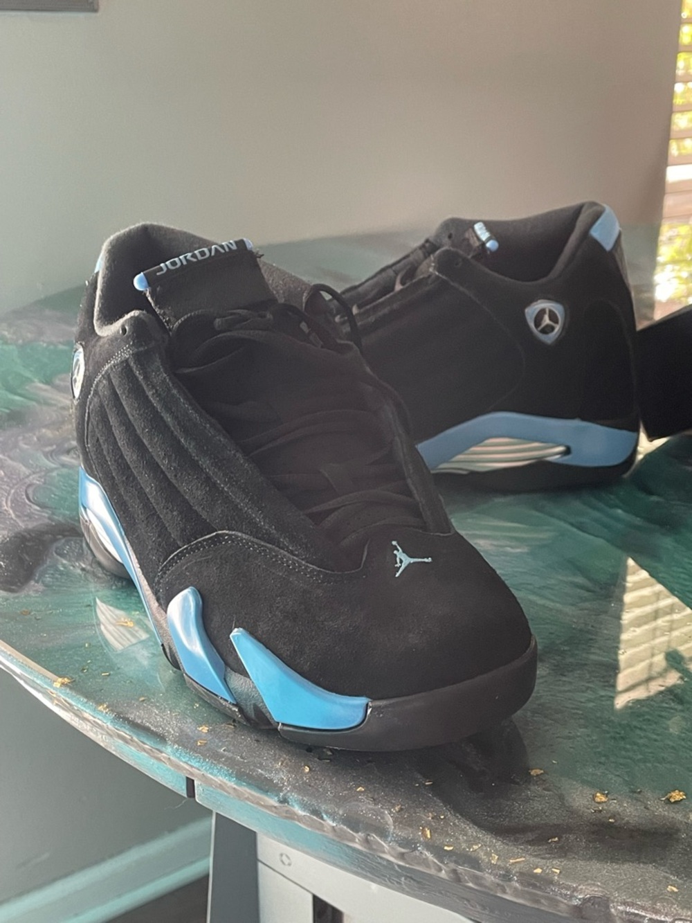 Air Jordan 14 Retro Men’s Black and University Blue Retro Sneakers
